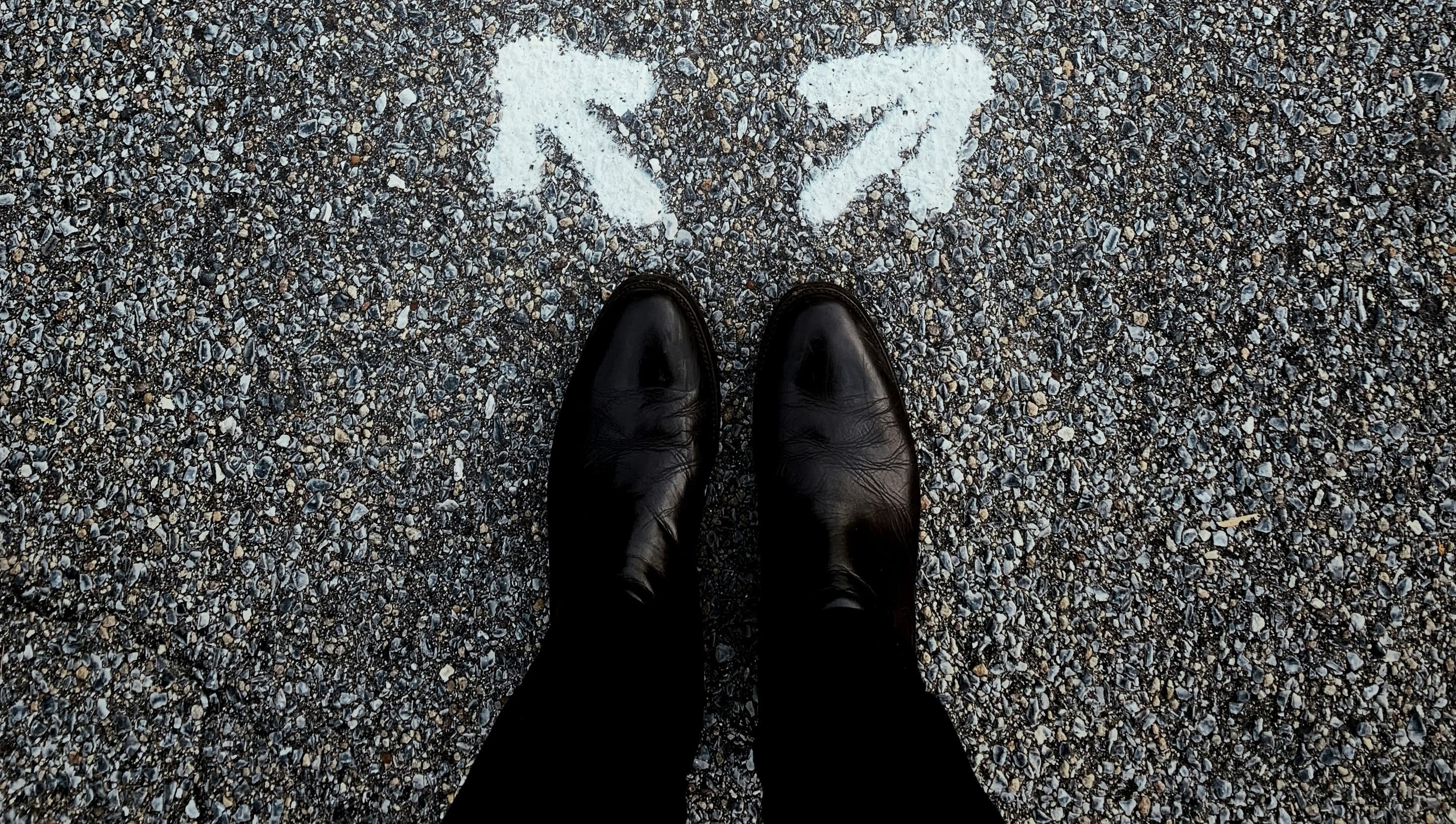 person at a crossroads representing career change decisions
