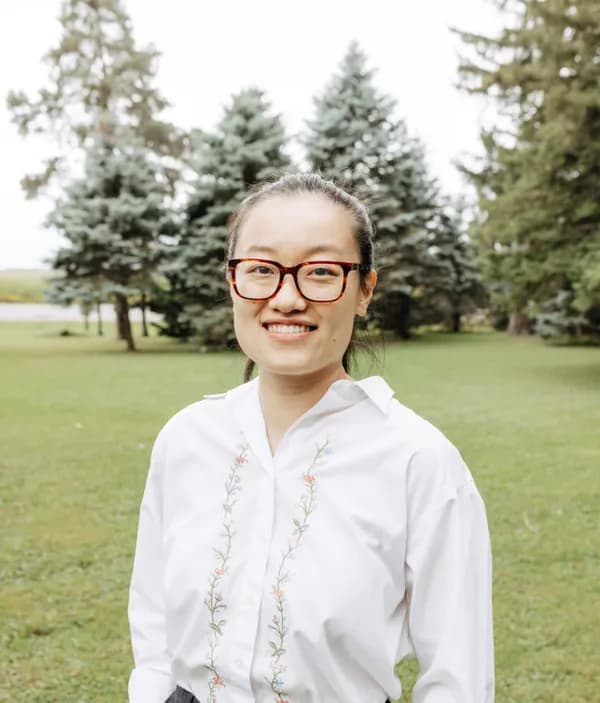 Headshot of Xue Qing Yang