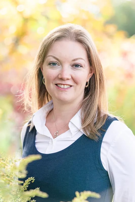 Professional headshot of Emily Hiram, Registered Psychotherapist (ON)