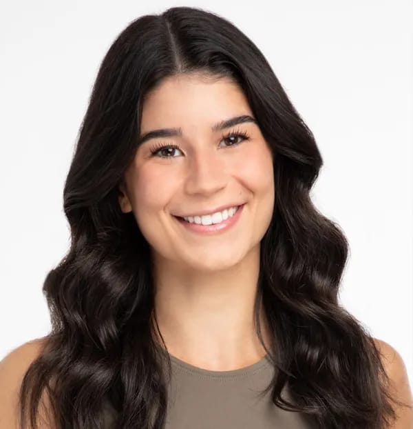 Professional headshot of Alexia Carbone, Registered Psychotherapist (Qualifying) (ON)