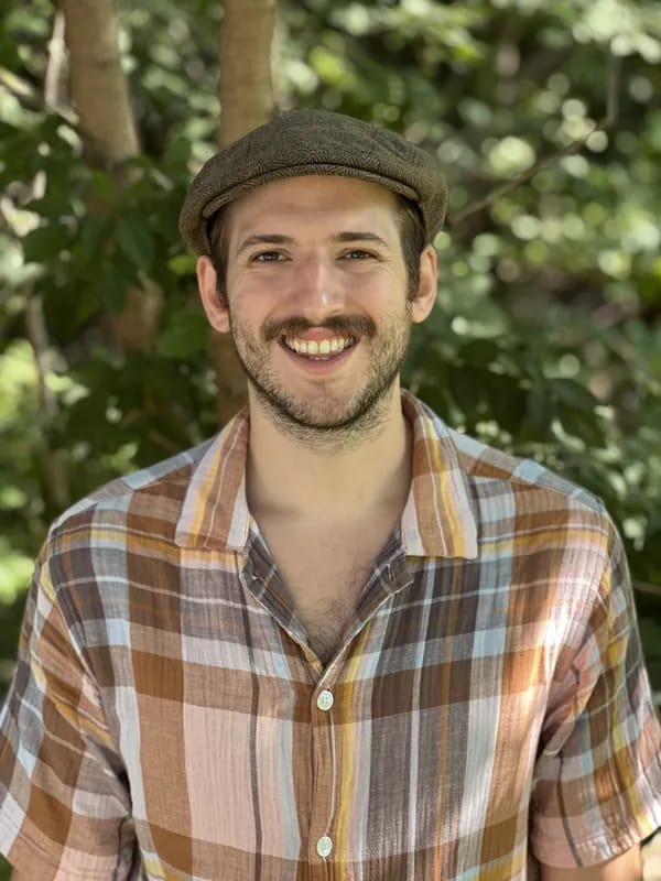 Professional headshot of Justin Appler, Registered Psychotherapist (Qualifying) (ON)