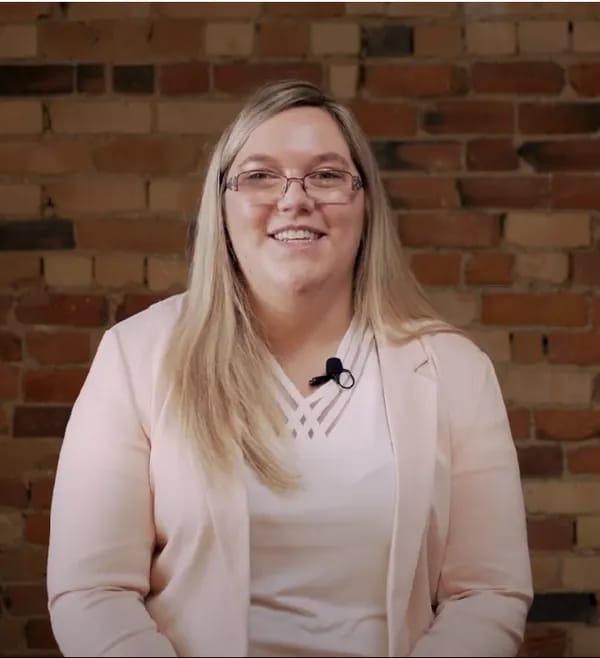 Professional headshot of Emily Duggan, Registered Psychotherapist (ON)