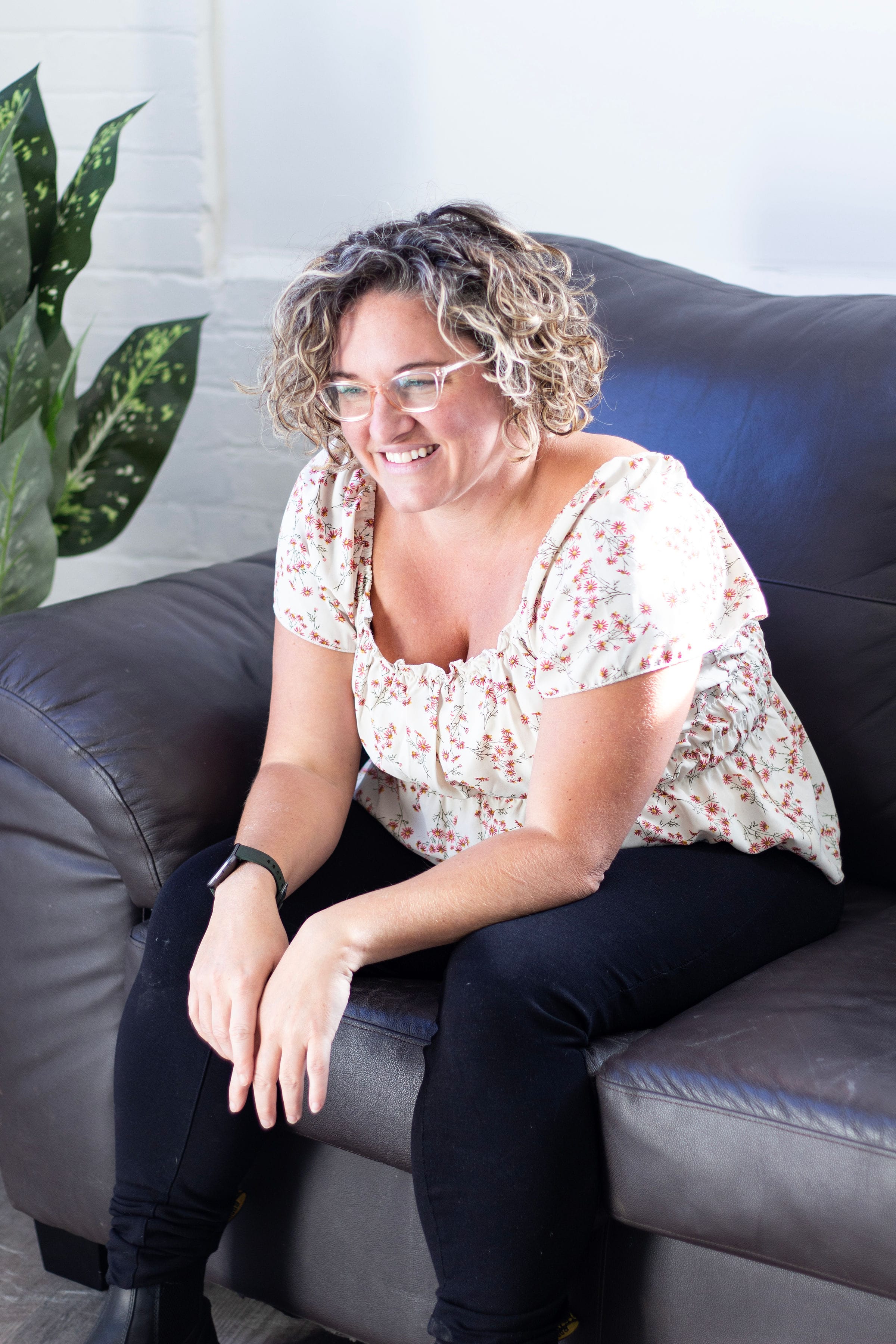 Professional headshot of Ashley Neveu, Registered Psychotherapist (ON)