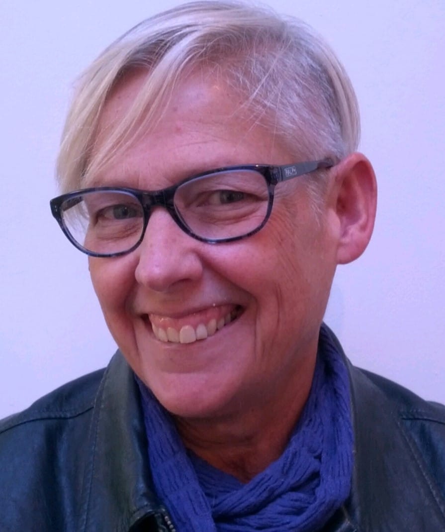 Professional headshot of KATHY MOSBAUGH, Registered Psychotherapist (ON)