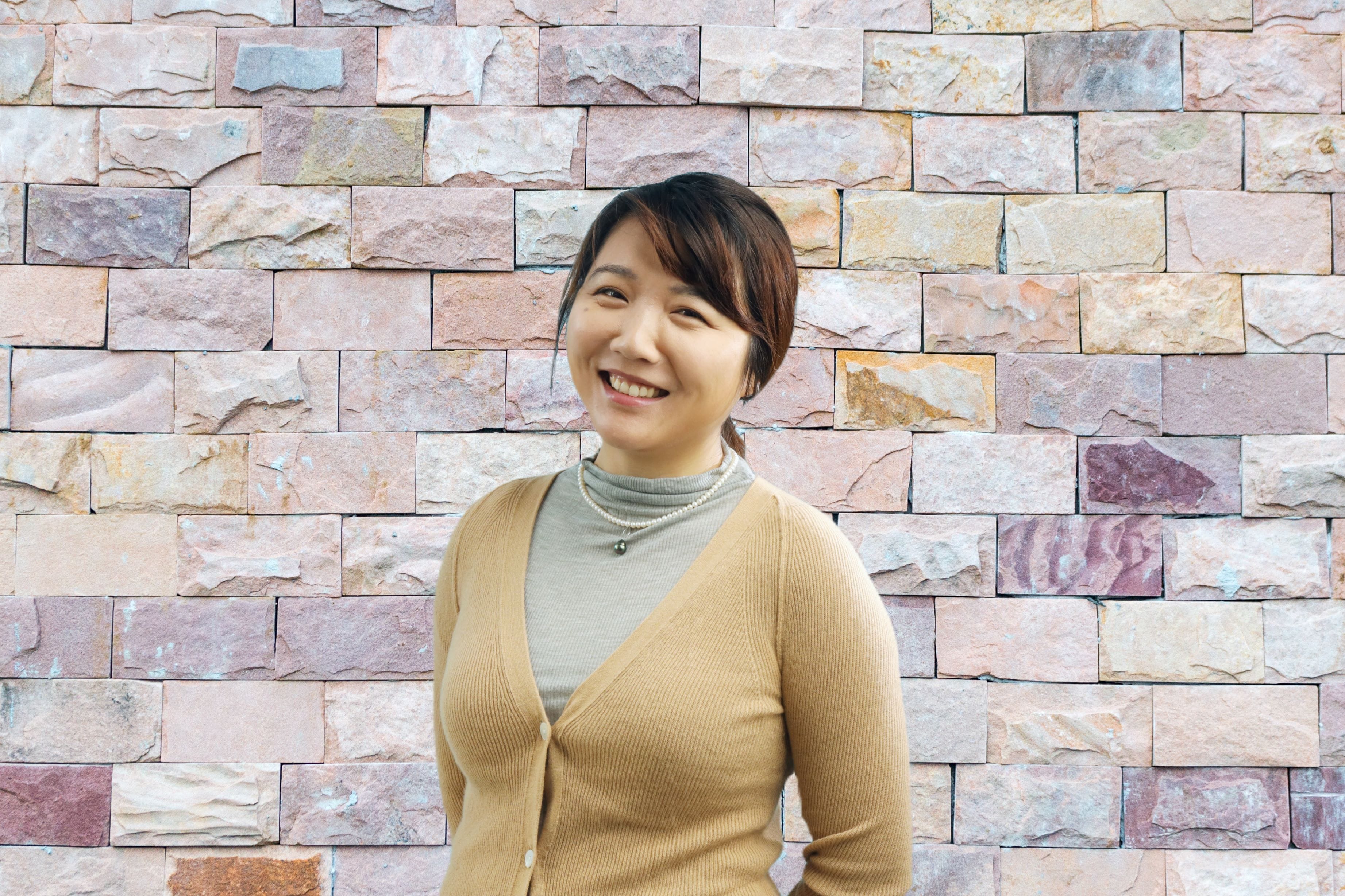 Professional headshot of Li Li, Registered Psychotherapist (Qualifying) (ON)