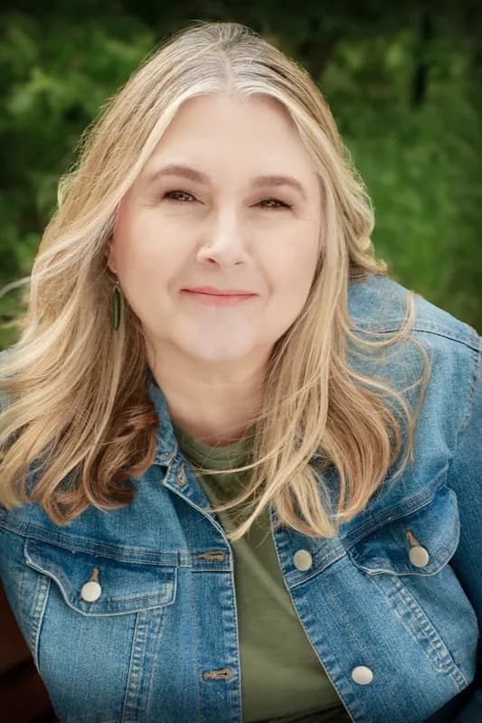 Professional headshot of Renée Dangerfield-Allen, Registered Social Worker (AB)